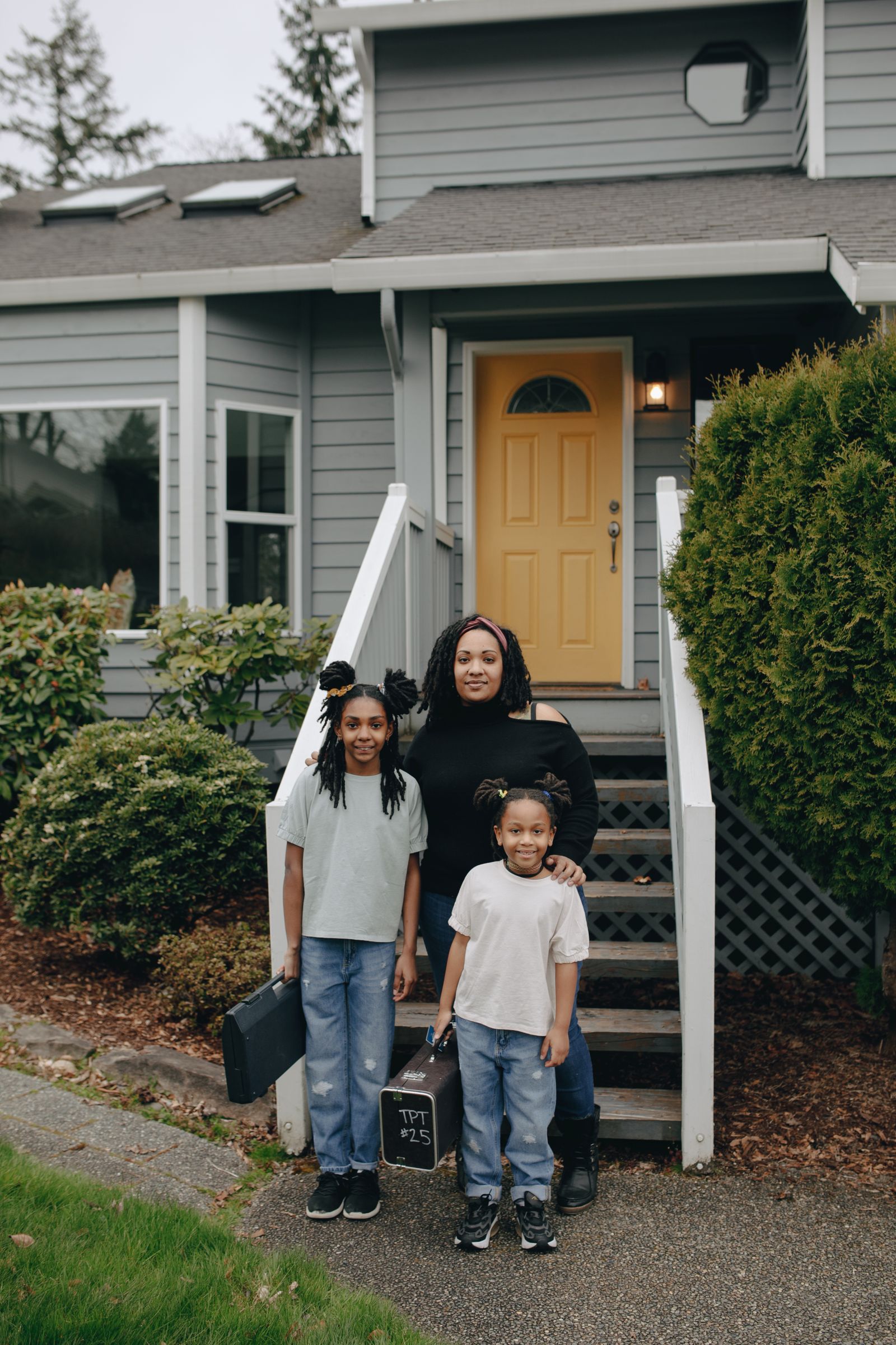 Family outside their home