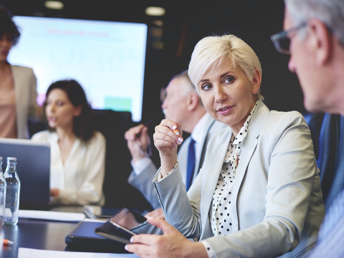 Professionals reviewing regulatory guidance