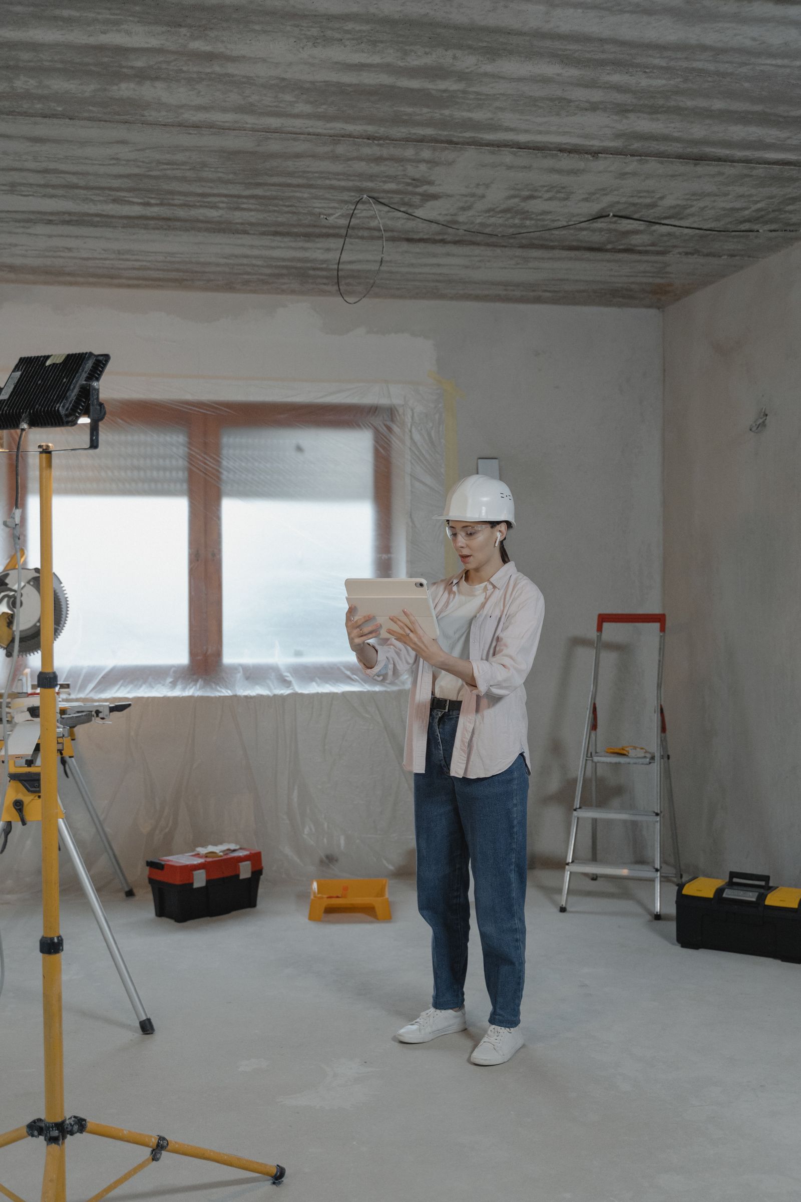 Inspector using a tablet inside a property